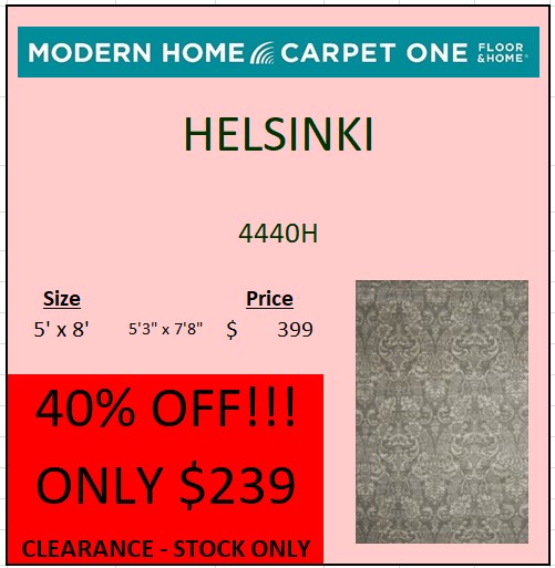 Picture of a clearance area rug that is grey with a pattern